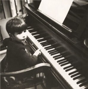 Olivier Milchberg, 3 years old, at the piano