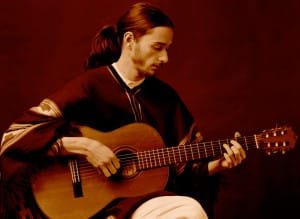 Olivier Milchberg playing guitar, 1984, Grenoble